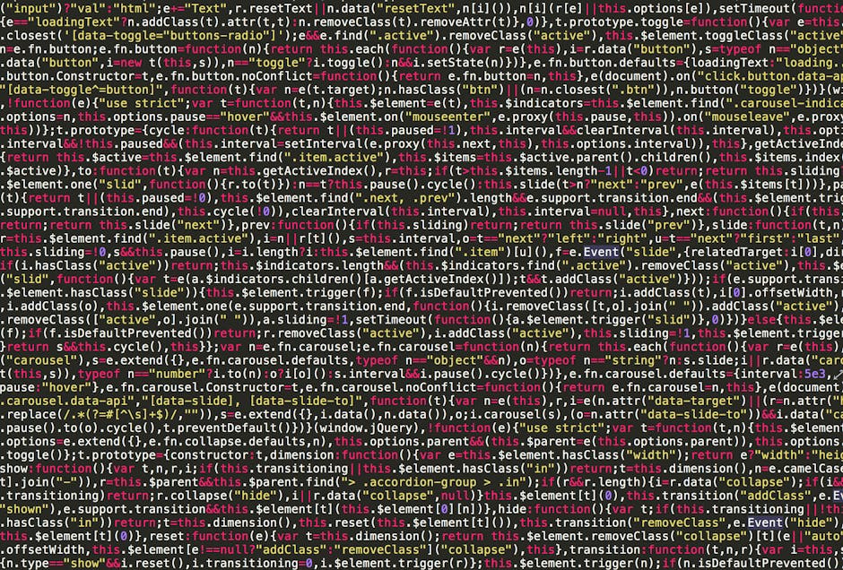 A close-up view of a computer screen displaying lines of programming code with syntax highlighting in various colors, including green, blue, yellow, orange, and pink. The text consists of typical code
